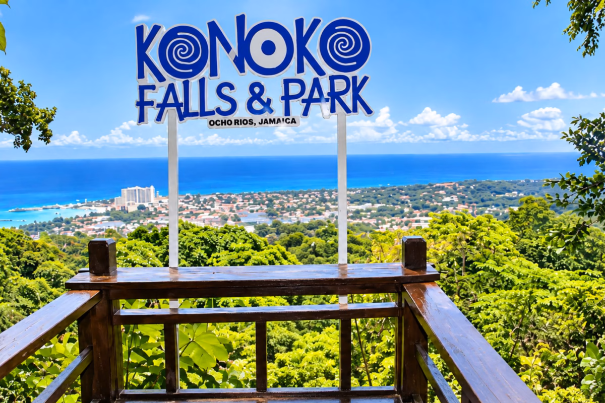 Konoko Falls & Park sign on a lookout above Ocho Rios and the coast